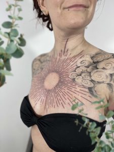 Sun tattoo - moon tattoo - chestpiece - clouds - illustrative tattoo - Breda - studio zwartzout