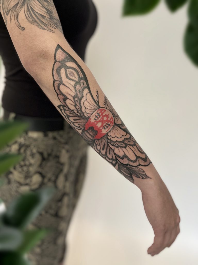 Sleeptoken moth tattoo